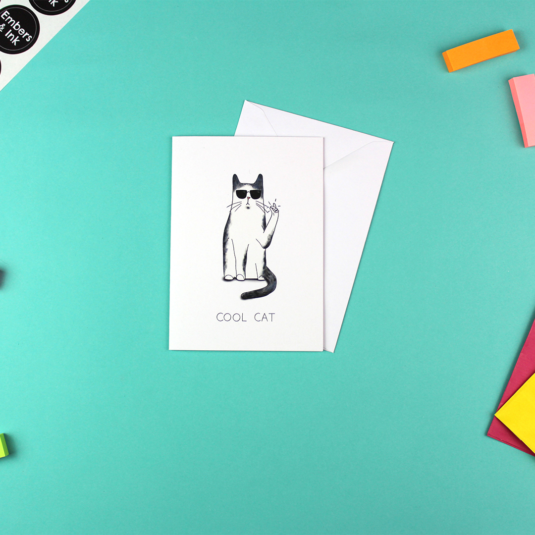 The Cool Cat Card is shown with a white envelope.