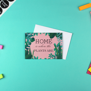 The home is where the plants are card is shown with its white envelope