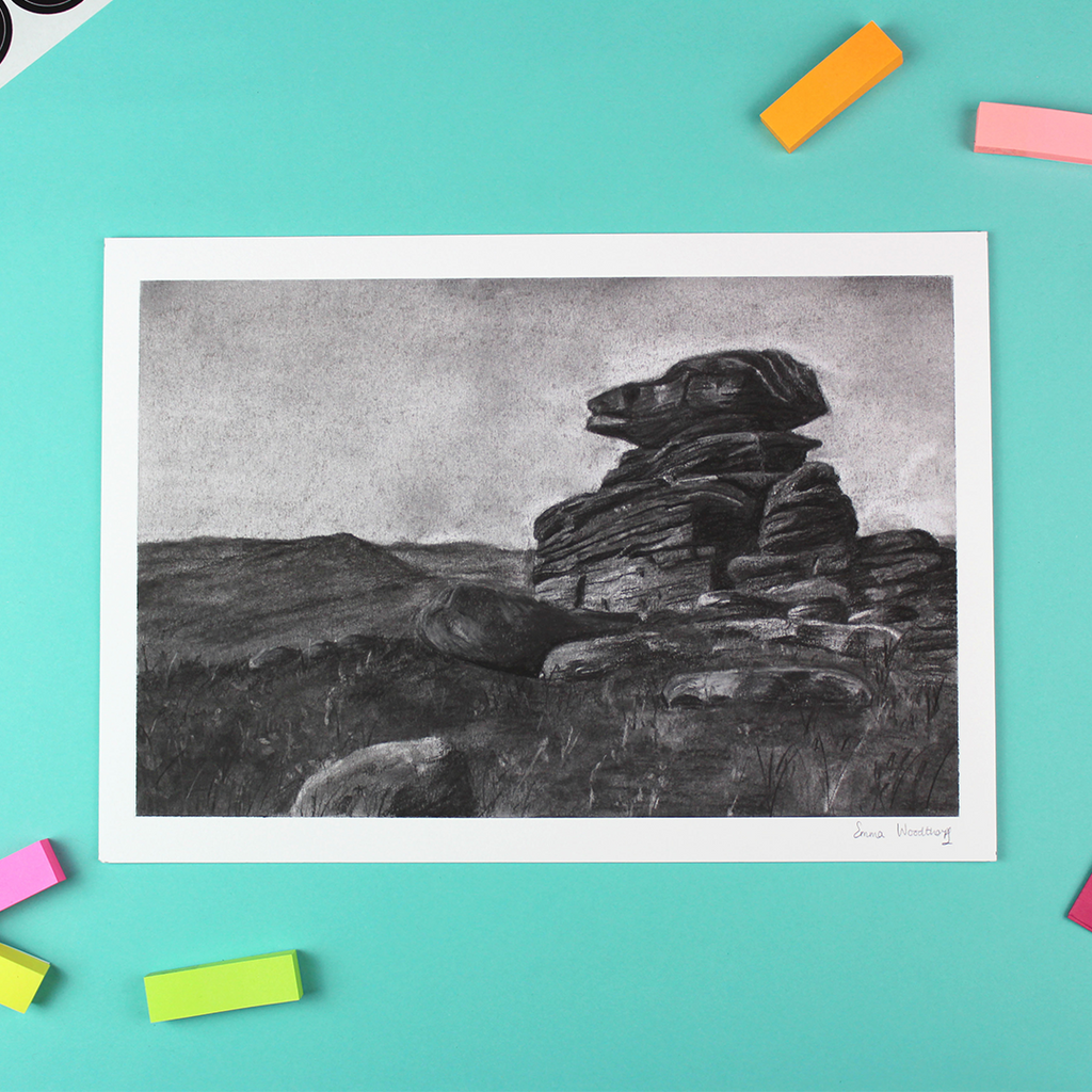 the picture shows a landscape orientated carcoal landscape drawing of a rock formation in the peak district called Mother Cap.
