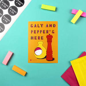 The Salt and Pepper's Here small aty print is shown on a table.