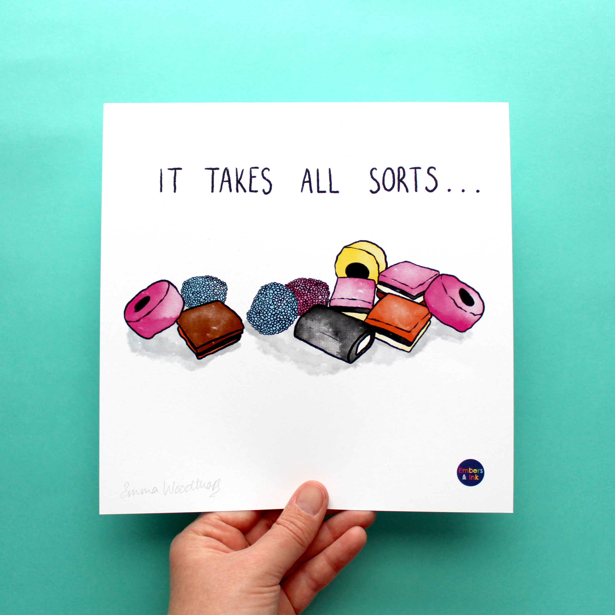 A square art print with an illustration of a pile of All Sorts sweets is shown. On the print, above the illustration, are the words 'it takes all sorts'