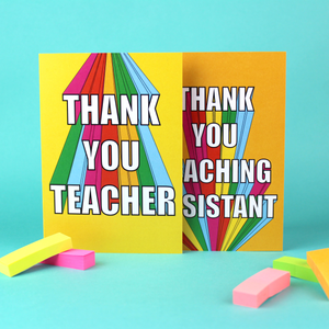 Two cards are shown, one with a yellow background and one with an orange background. Both cards have rainbow block lettering. One card reads Thank you teaching assistant. The other reads Thank you teacher.