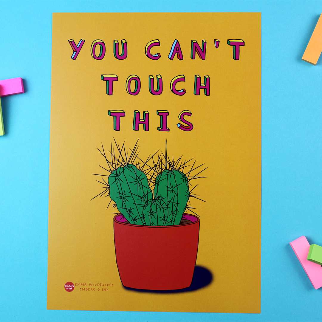 The You Can't Touch This poster is pictured ona table.