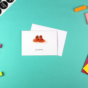 The cool beans card is shown with its white envelope