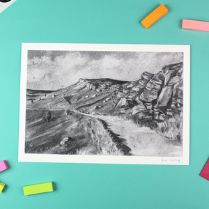 image shows a landscape orientated charcoal drawing of a peak district landscape. It features an area known as Secret Stanage which is a gritstone escarpment. 