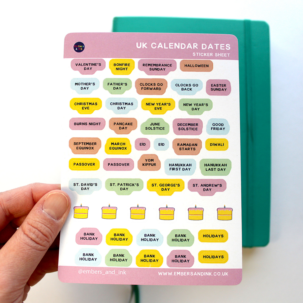 a hand holds an A6 sticker sheet with UK calendar dates and holidays on it. Dates include Valentine's Day, Bonfire Night, Clocks go forward, Clocks go back, Christmas, burns night, st David's day, Eid, Tim Kippur and Bank Holidays amongst others.
